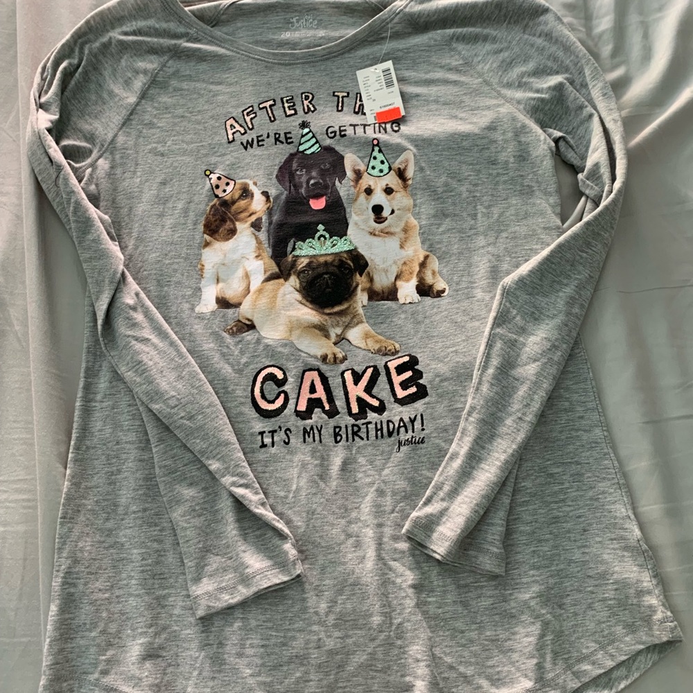 a grey long sleeved tee